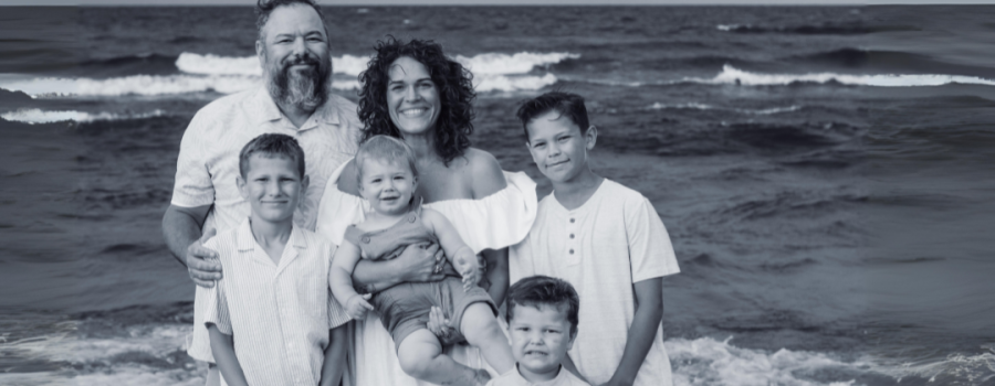 Matthew, Ingrid and family on a beach