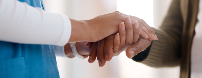 two people holding hands