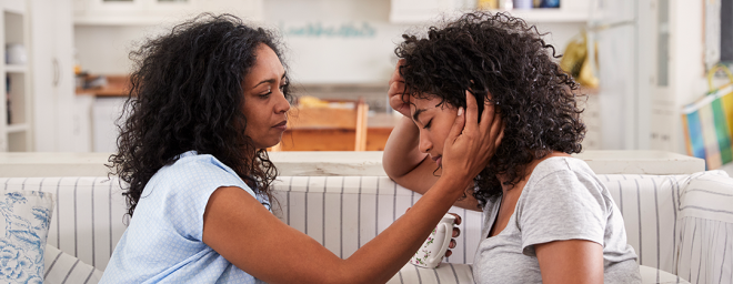 Mother showing love to daughter