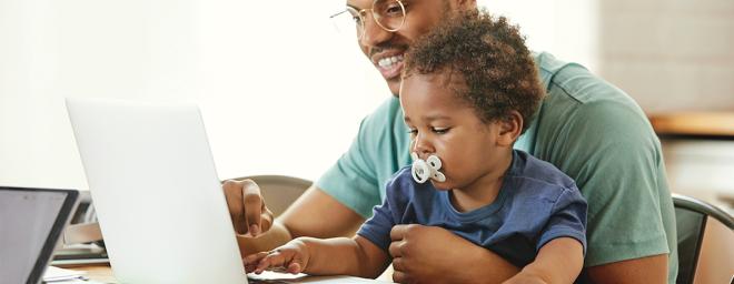 Dad and son reading blogs