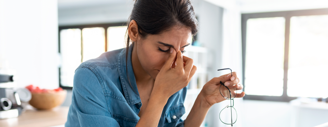 A women fatigued after zoom meetings